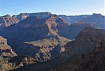 (Viewed from southeast) Tower of Set peak-(center) Horus Temple prominence-(extreme left) Shiva Temple (Grand Canyon), forested tableland summit on the left horizon (photo note: Tower of Set, has the 2 closer prominences)