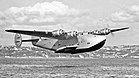 Eine Boeing 314 Clipper im Fluge 1941 (vermutlich vor Bermuda). Mit Maschinen dieses Typs wurde ab 28. Juni 1939 von der Pan Am die erste transatlantische Passagier-Linienflugverbindung eingerichtet. KW 27 (ab 30. Juni 2019)