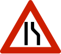 Road narrows On right side.