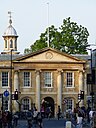 ☎∈ Front facade of Emmanuel College, Cambridge viewed from Downing Street.