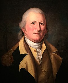 A head and shoulders portrait of William Moultrie. Painted in middle age, he wears a military uniform jacket that is blue with gold trim.