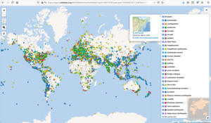 map of the world with many spots representing the locations of disasters