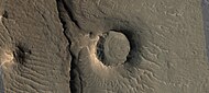 Eroded craters, as seen by HiRISE. One crater is half eroded away. Another crater has eroded to form a tall, thin rim, and its ejecta has been eroded away. This image is part of an image that was named HiRISE picture of the day.