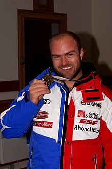Poisson mit seiner WM-Bronzemedaille (2013)