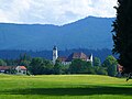 Bažnyčia Alpių panoramoje