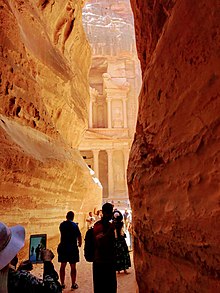 A beautiful view of the treasury through the gap of rocks over 50 meters high!