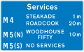 Availability of motorway service areas ahead with distances and names of operators