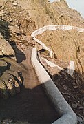 Channels used to funnel rainwater into tanks for storage