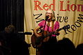 Sue Graves performing at Isleworth's Red Lion pub at a TwickFolk concert, Twickenham Heartbeat, recorded and broadcast live by BBC Radio Wales on 9 March 2014