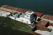 Towboat Dakota Storm upbound on Ohio River at Matthew E. Welsh Bridge (2 of 4), near Mauckport, Indiana, USA, 1987