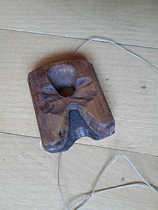 Hand-carved wooden nose whistle