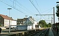 Oud en ondertussen afgebroken stationsgebouw van het station