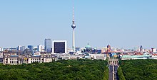 City skyline, with trees in foreground