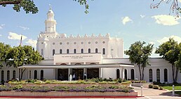 The St. George temple in the background, with the annex in the foreground, a garden can be seen in the front.