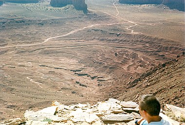 Layers in Monument Valley. These are accepted as being formed, at least in part, by water deposition. Since Mars contains similar layers, water remains as a major cause of layering on Mars.