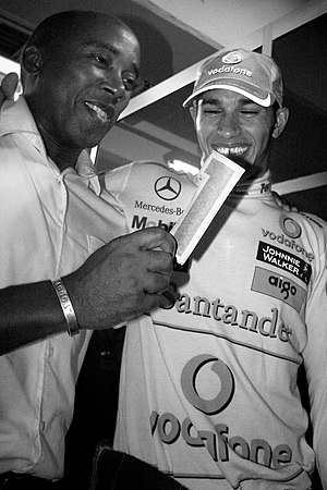 Lewis Hamilton celebrating his title win in 2008 with his father Anthony Hamilton