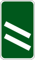 200 m (220 yd) to a roundabout or the next point at which traffic may leave a primary route