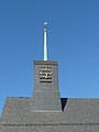 Dachreiter mit Turmuhr und Wetterhahn