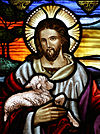 Stained glass at St John's Ashfield, illustrating Jesus' description of himself, "I am the Good Shepherd", from the Gospel of John, chapter 10, verse 11.