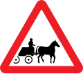 Horse-drawn vehicles likely to be in the road