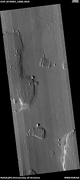 Wide view of various shapes created by erosion, as seen by HiRISE under HiWish program