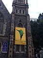 Image 21Church on Greenmarket Square in Cape Town, South Africa with a banner memorialising the Marikana massacre (from History of South Africa)