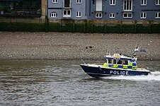 London Metropolitan Police boat John Harriott IV on the Thames