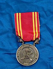 Kronobergs regementes minnesmedalj i silver.