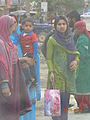 Left and right: phiran shalwar; centre: Punjabi suits