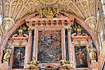 The upper region of the altar, with the central canvas of the Assumption