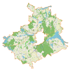Mapa konturowa gminy wiejskiej Ełk, w centrum znajduje się owalna plamka nieco zaostrzona i wystająca na lewo w swoim dolnym rogu z opisem „Sunowo”