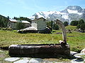 Image 31In the summers the cows are brought up to the high mountain meadows for grazing. Small summer villages such as the one shown in this photograph taken in Savoy are used. (from Alps)