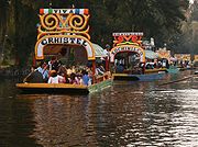 Brightly painted trajineras on the canals