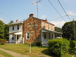 One of the four Coulsontown Cottages in Coulsontown