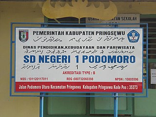 Papan tanda SDN 1 Podomoro, Pringsewu, Lampung