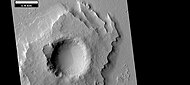 Pedestal crater with layers, as seen by HiRISE under HiWish program Location is Amazonis quadrangle.