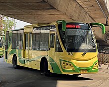 Modern green-and-yellow bus