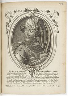 portrait en noir et blanc d'un homme portant barbe et turban tenant une épée.