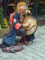 Gatemusikant i Poznań 2005 som spiller bandura, tradisjonell ukrainsk siter. Musikeren har ukrainsk folkedrakt, kosakkbarter og tsjub .