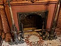 Unused fireplace in the entryway