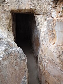 A narrow channel, cut through rock