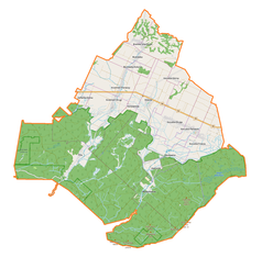 Mapa konturowa gminy Dzwola, blisko centrum u góry znajduje się punkt z opisem „Dzwola”