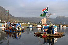 Colourful rafts on a lake