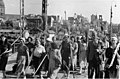 Paramilitary police with workers, Riga, July 11, 1941 (Wehrmacht photo)