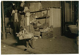 10:30 P.M. At Center Market. 11 yr. old Celery Vendor Gus Strateges, 212 Jackson Hall Alley. He sold until 11 P.M. and was out again Sunday morning selling papers ana gum. Has been in this country only a year and a half. Location: [Washington (D.C.), District of Columbia