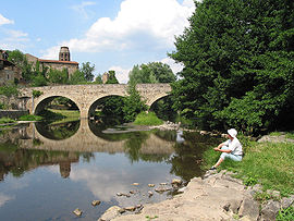 Bridge on the Senouire River and St. André abbey.