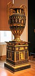 Egyptian Revival vase with pedestal; 1804–1806; varnished sheet and gilded bronze; height: 1.80 m, depth: 0.95 m; Louvre[17]