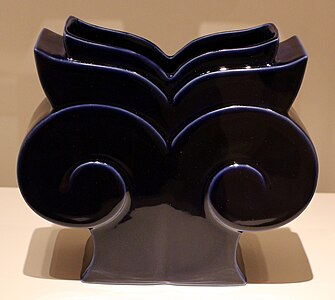 Postmodern vase inspired by the Ionic capital, deisgned by Michael Graves for Swid Powell, 1989, glazed porcelain, Indianapolis Museum of Art, Indianapolis, US[35]