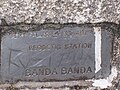 Nameplate at the summit of Mount Banda Banda, elevation 1258 metres