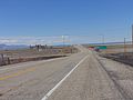 Looking northwest at the Interstate 80 and Utah State Route 202 interchange (the northern terminus of SR-202) with Stansbury Island, the Great Salt Lake, and Saltair in the background, March 2016